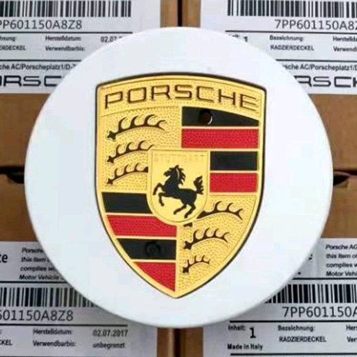 Set of four silver Porsche wheel centre caps by Eliteridegear, showcasing sleek, round design for car wheel decoration.