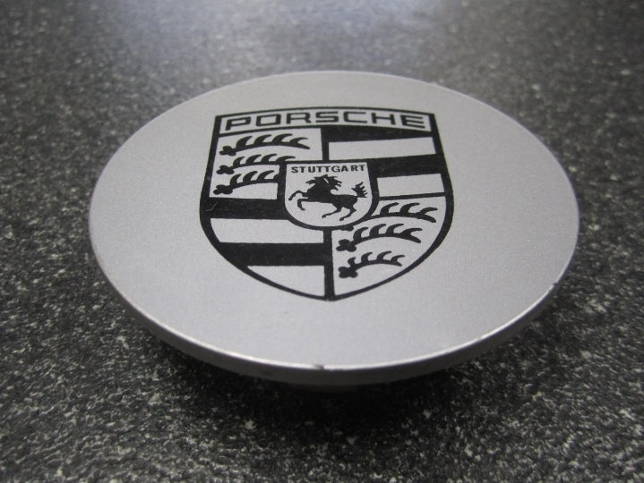 Set of four Eliteridegear Porsche rim centre caps in silver and black, designed for Porsche wheel decoration.