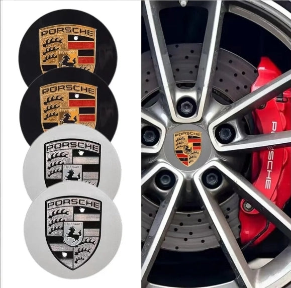 Set of four silver and black Porsche rim centre caps with Eliteridegear branding, showing close-up of the caps on a car wheel