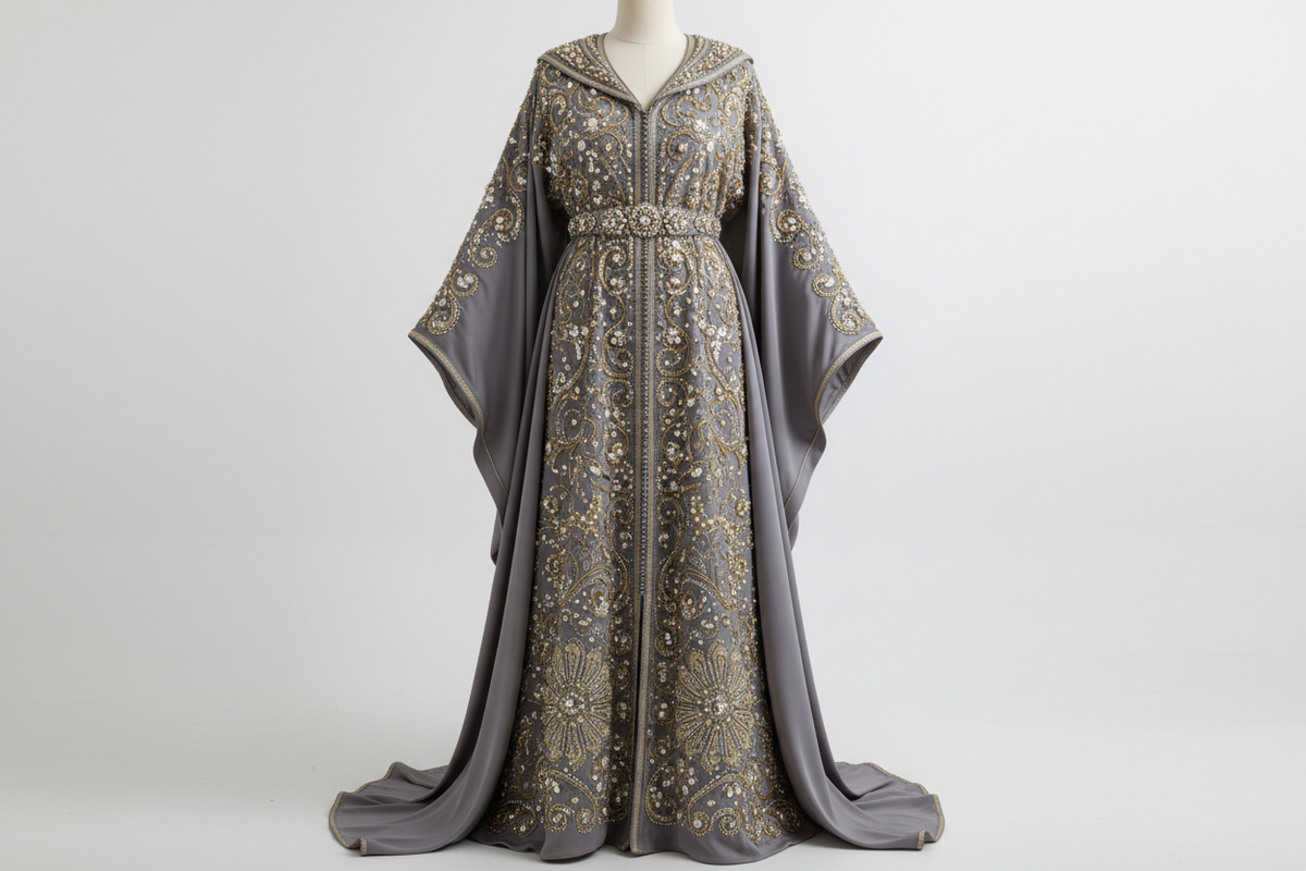 Royal blue Moroccan caftan evening dress with long sleeves and appliques, featuring elegant, traditional Moroccan design.
