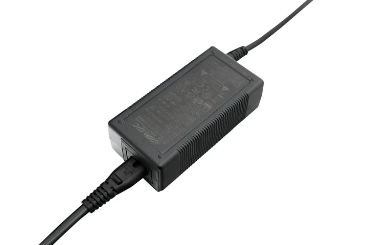 Simagic P-APS accessories power supply for haptic, LED, and heel-stop modules, compatible with racing sim pedals.