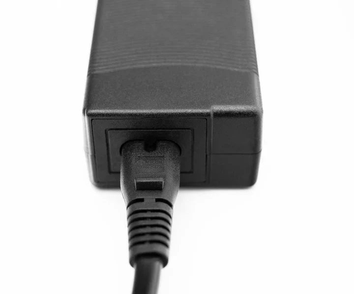 Simagic P-APS accessories power supply unit for Trak Racer UK pedals, supporting haptic, LED, and heel-stop modules.